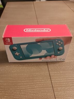 Nintendo Switch Lite Teal Handheld Console  Nintendo + 2 Games + NewTravel Case